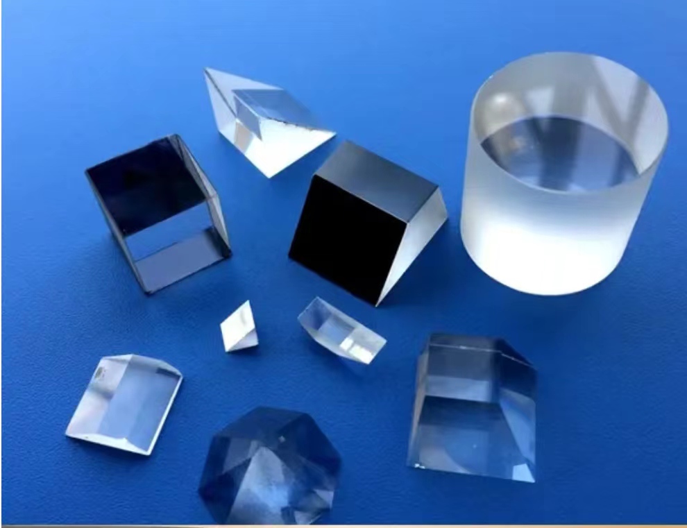 Optical prisms in multiple materials and geometries